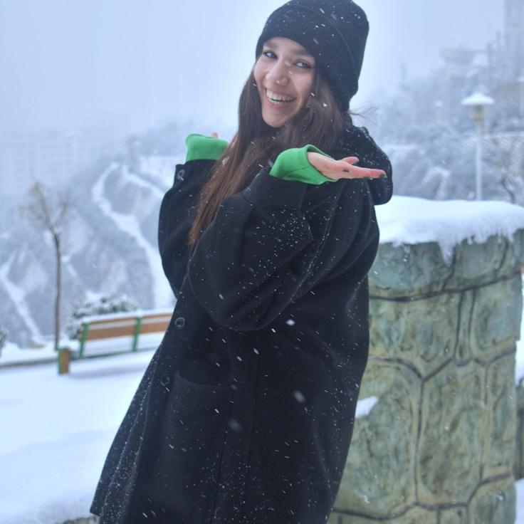 Portrait of Mira Chen, group coordinator and fusion cooking expert